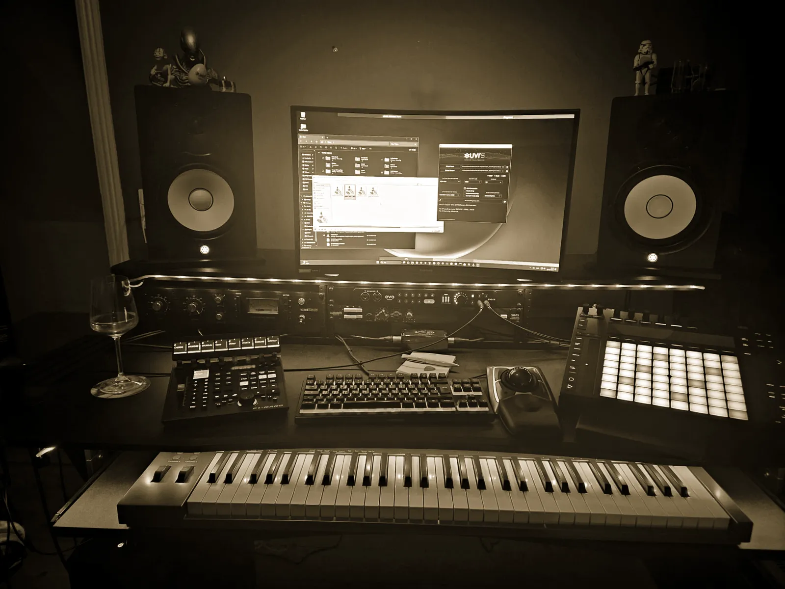 The desk at ZimmerZounds: monitors, keyboard, pad controller and the session on screen